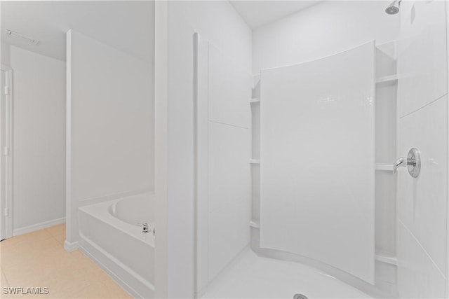 bathroom featuring separate shower and tub and tile patterned flooring