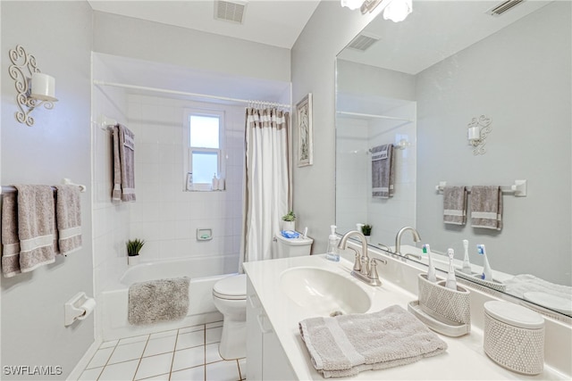 full bathroom featuring vanity, shower / tub combo with curtain, tile patterned floors, and toilet