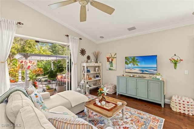 living room featuring dark wood-type flooring, ceiling fan, lofted ceiling, and crown molding