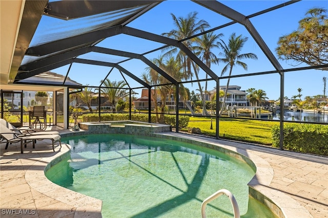 view of pool with a lanai, an in ground hot tub, a patio, and a water view