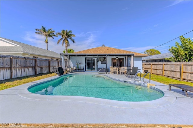 view of pool featuring a patio area