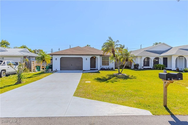 ranch-style home featuring a garage and a front yard