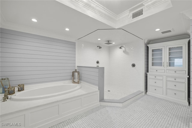 bathroom with crown molding and shower with separate bathtub