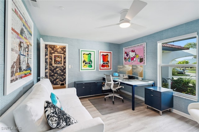 office featuring ceiling fan and light wood-type flooring