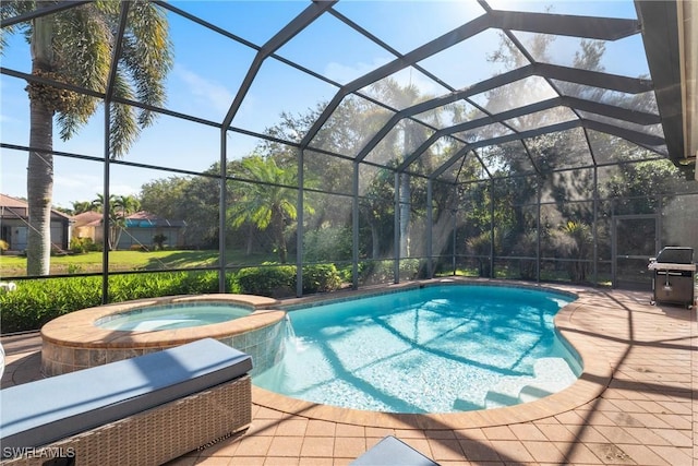 view of pool with a lanai, a patio area, grilling area, pool water feature, and an in ground hot tub