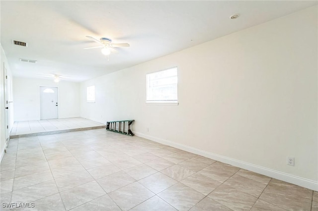 empty room featuring ceiling fan