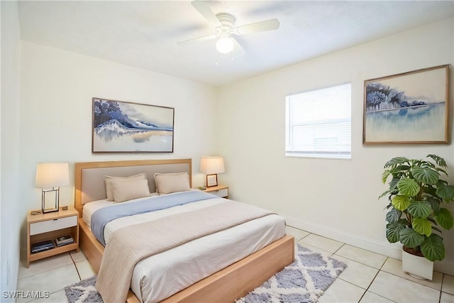 bedroom with light tile patterned floors and ceiling fan