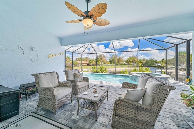 view of patio featuring a swimming pool with hot tub, outdoor lounge area, and glass enclosure