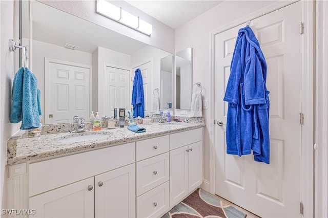 bathroom featuring vanity