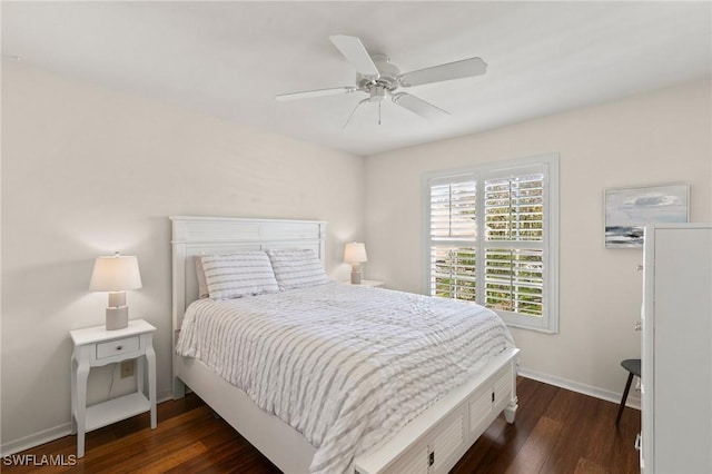 bedroom with dark wood-type flooring and ceiling fan