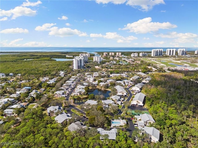 bird's eye view with a water view