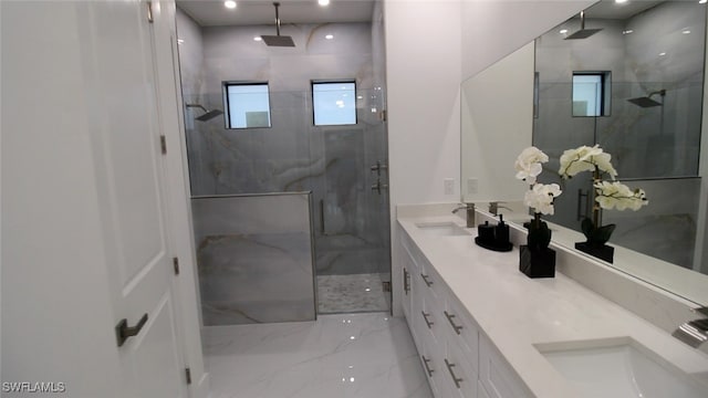 bathroom featuring vanity and walk in shower