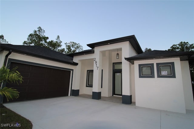 view of front of house with a garage