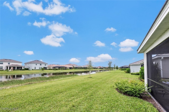 view of yard with a water view