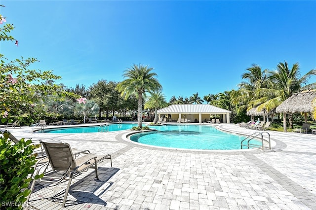 view of pool with a gazebo and a patio