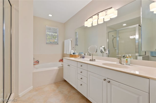 bathroom featuring vanity, tile patterned floors, and independent shower and bath