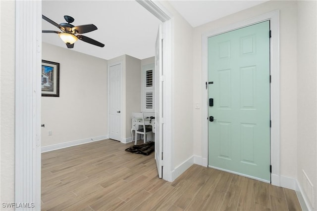 entrance foyer featuring ceiling fan and light hardwood / wood-style flooring