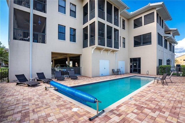 view of pool featuring a patio