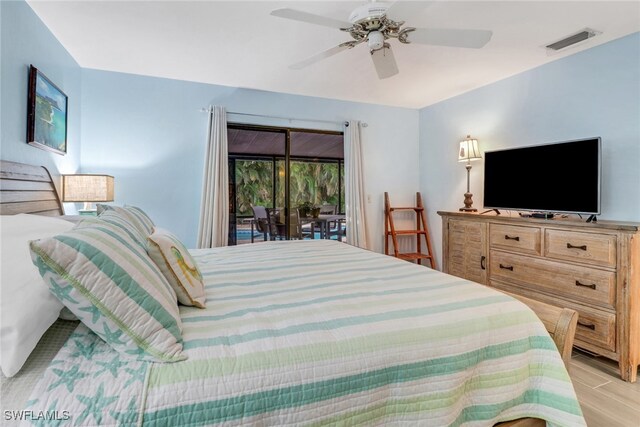 bedroom with access to outside, ceiling fan, and light wood-type flooring