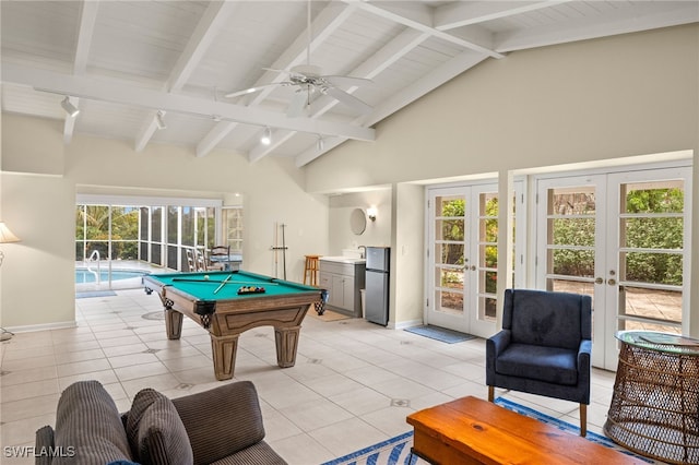 rec room featuring light tile patterned floors, french doors, beam ceiling, and billiards