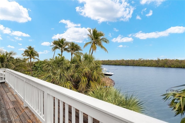 balcony featuring a water view