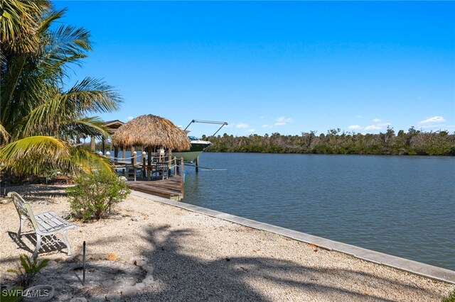 view of dock with a water view