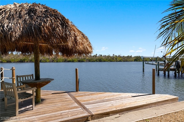 view of dock with a water view