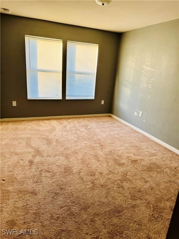 empty room with carpet floors