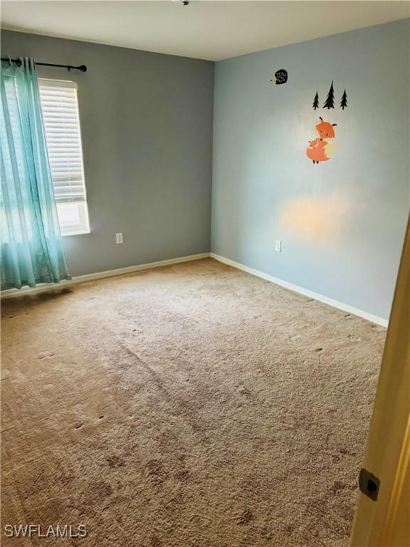 empty room featuring carpet