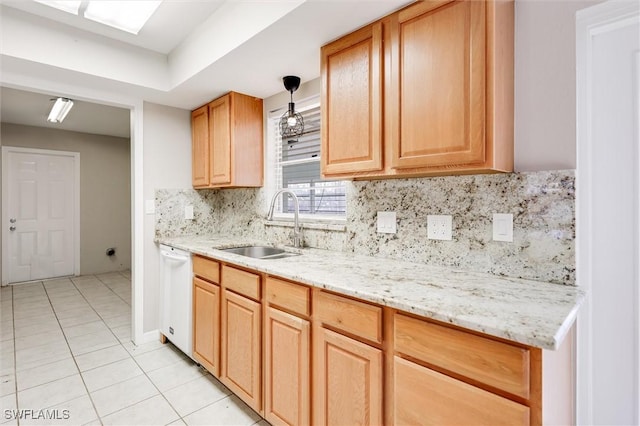 kitchen with sink, light tile patterned floors, dishwasher, pendant lighting, and decorative backsplash