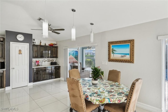 dining area with light tile patterned floors and ceiling fan