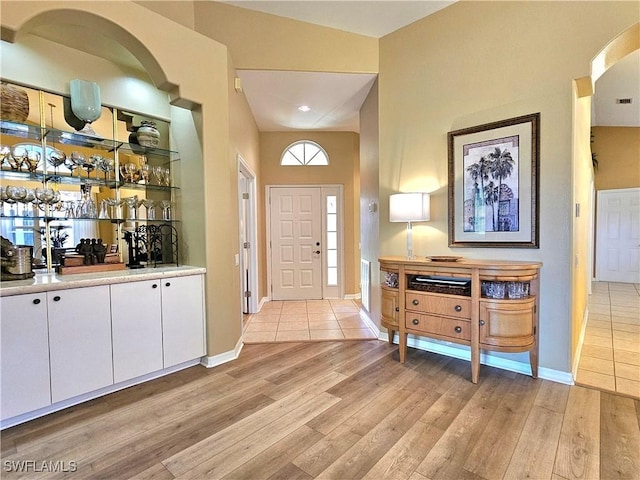 entrance foyer featuring light wood-type flooring