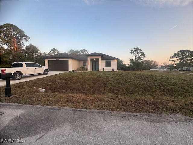 view of front of property with a garage