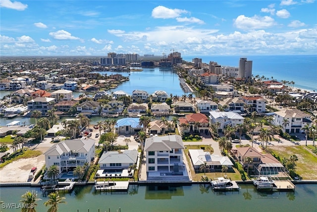 aerial view featuring a water view and a city view