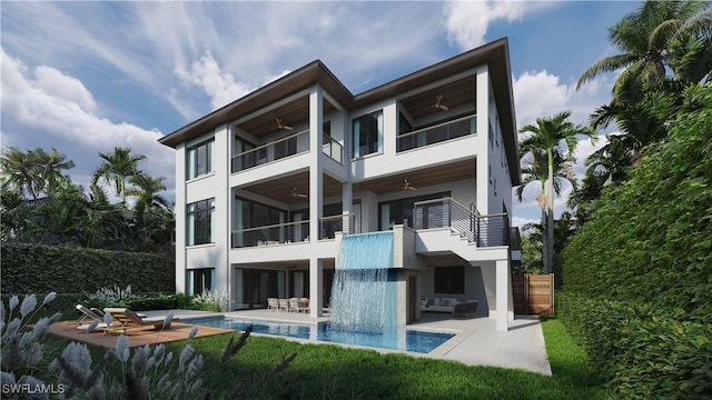 back of house with a patio, ceiling fan, a balcony, and stucco siding