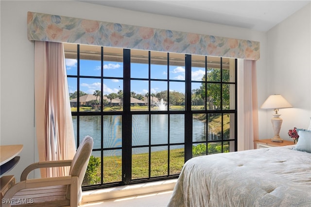 bedroom with a water view