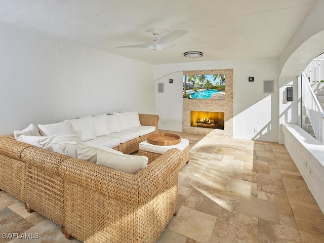 living room with ceiling fan