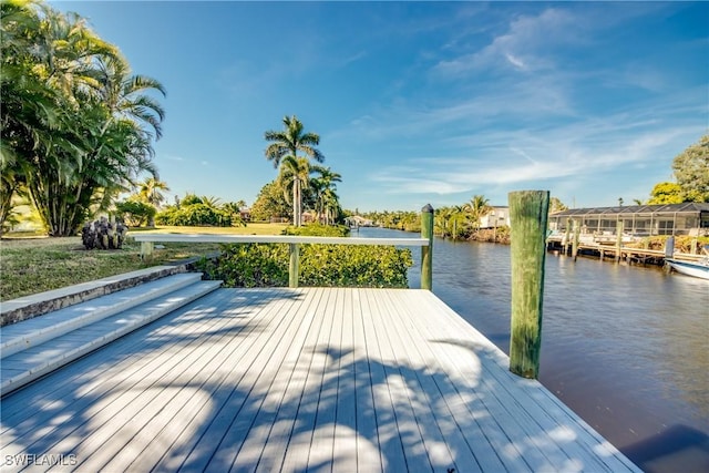 dock area featuring a water view