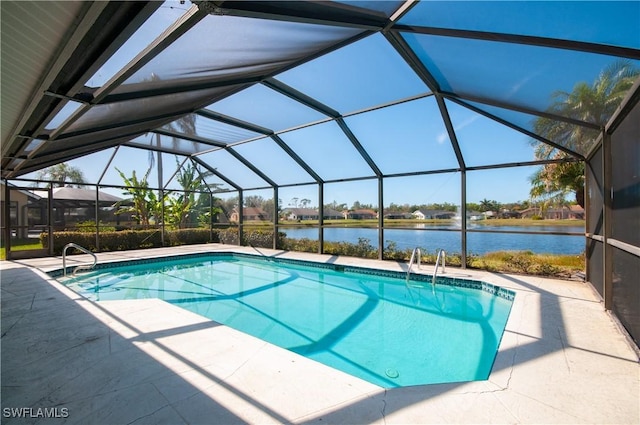 view of pool featuring a lanai, a patio, and a water view