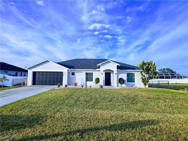 single story home with a garage and a front yard