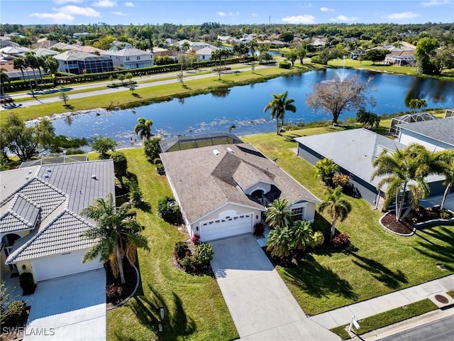 bird's eye view with a water view