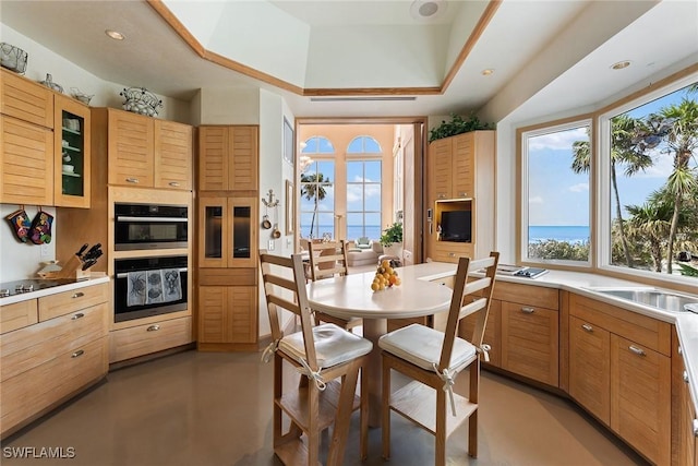 kitchen with double wall oven and sink