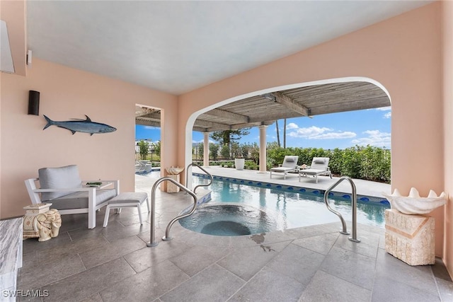 view of swimming pool with a patio area