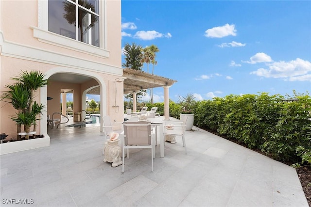 view of patio featuring a pergola