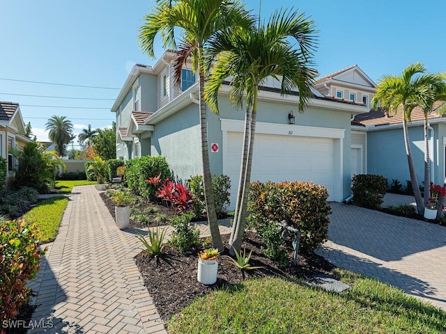 view of property exterior with a garage