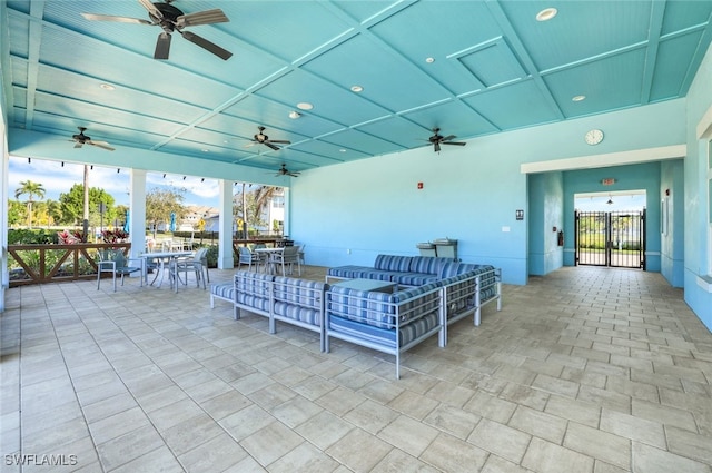 view of patio featuring ceiling fan