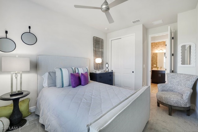 bedroom with light carpet, a closet, and ceiling fan