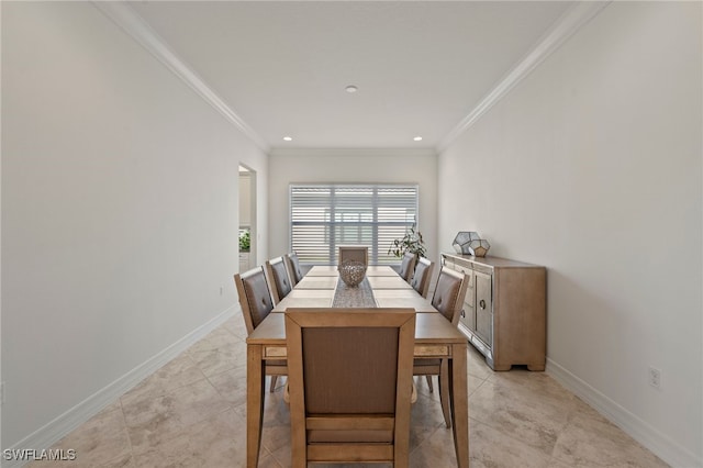 dining space with crown molding