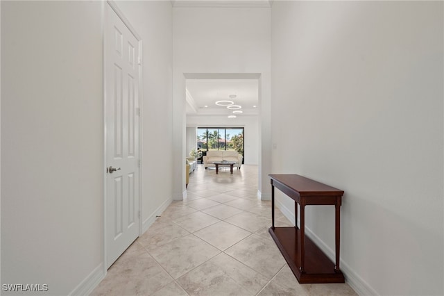 hallway with light tile patterned floors