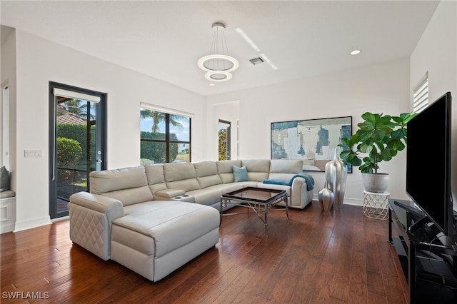 living room featuring dark hardwood / wood-style flooring